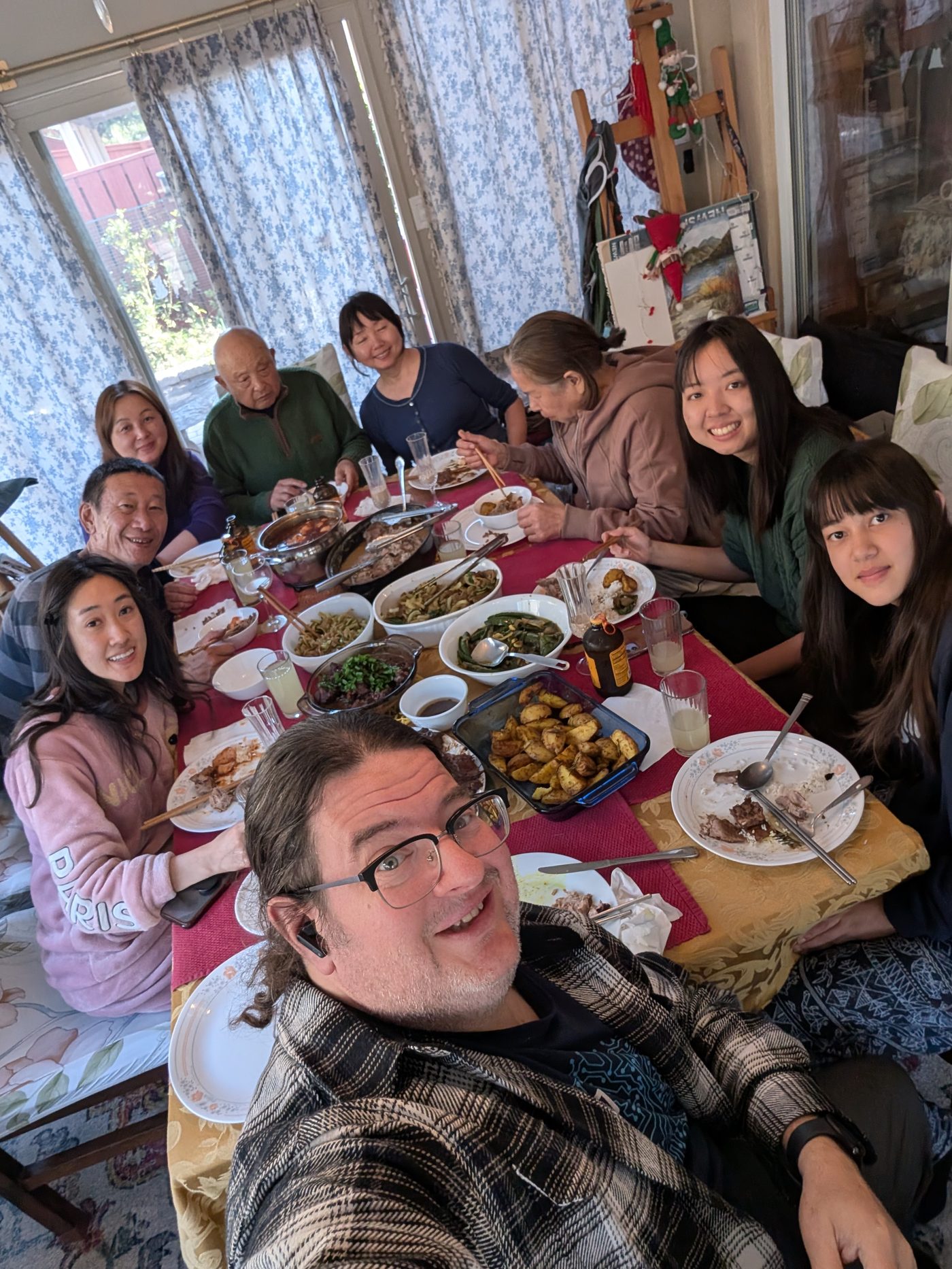 Family gathered around a table for a meal