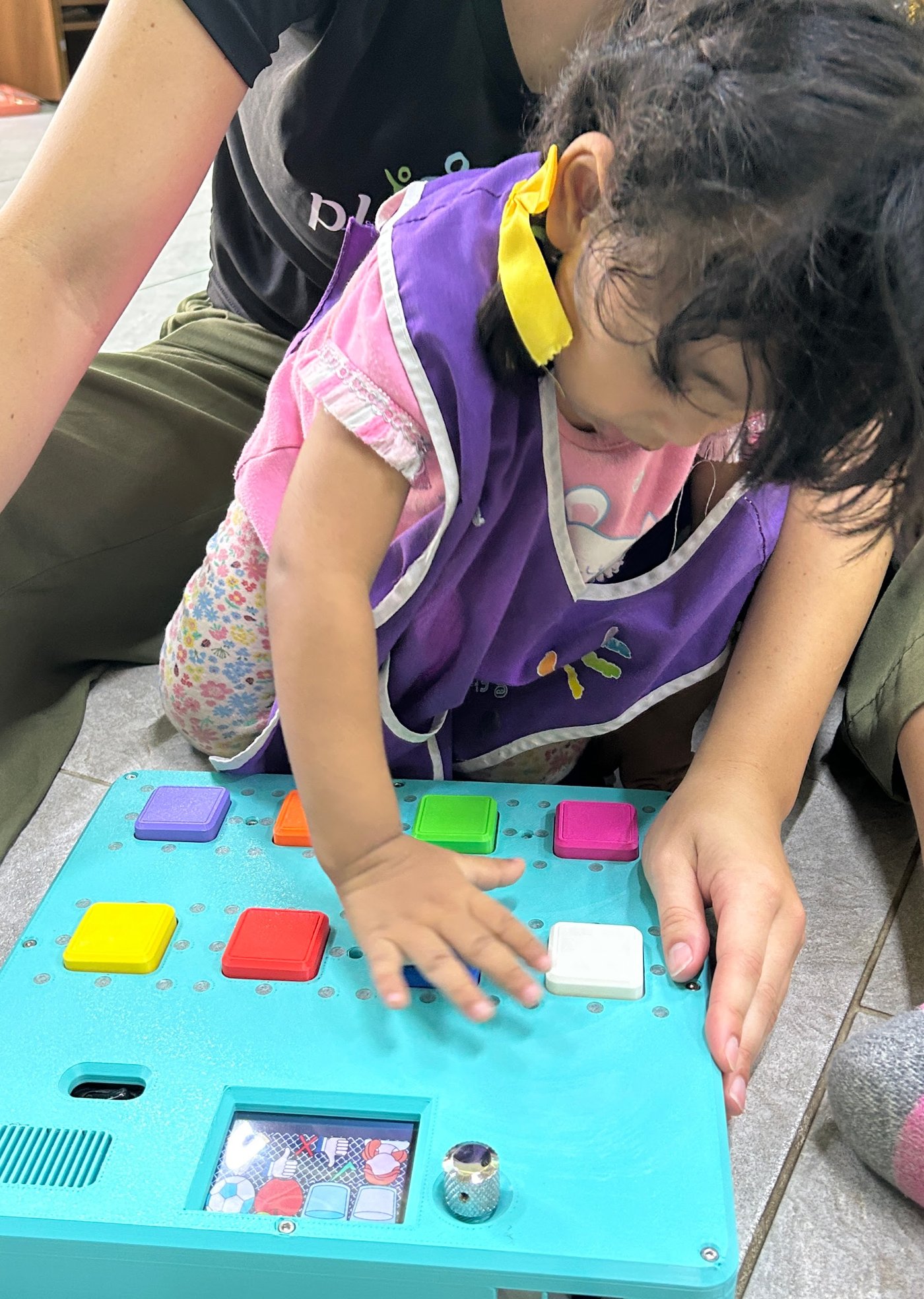 In use: a child building first associations