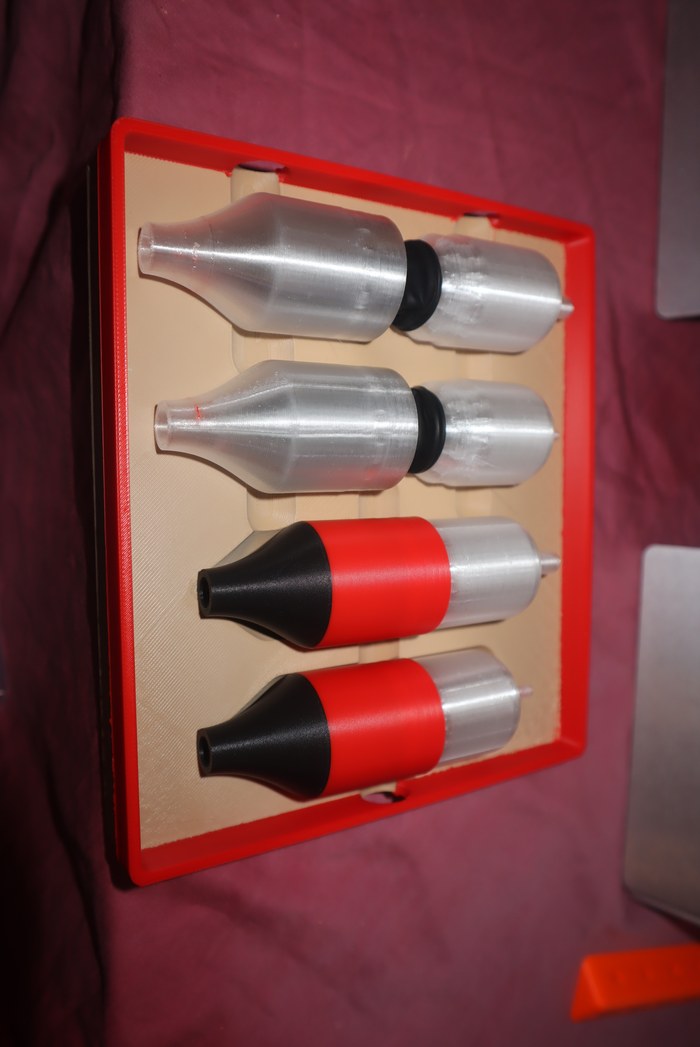 Low-Cost Air Isolator prototype — 3D-printed shells and clear tubing for sip-and-puff sensor isolation