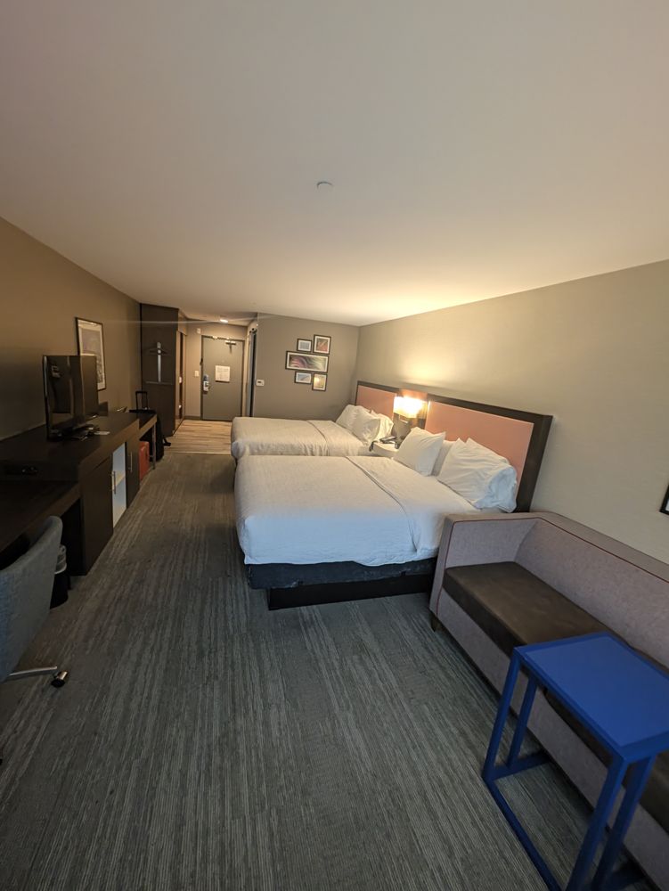 A hotel room with two beds, home base for the weekend