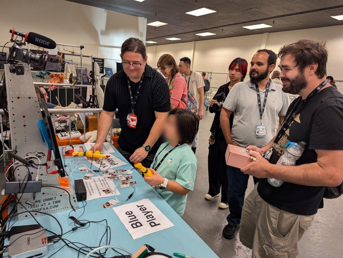 R.O.A.R. Rubber Chicken Challenge booth in action